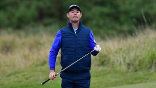 <p>Padraig Harrington of Ireland plays his third shot on the 18th hole during the first round of the Scottish Championship presented by AXA at Fairmont St Andrews. Picture: Mark Runnacles/Getty Images</p>