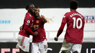 <p>Bruno Fernandes, centre, missed a penalty before helping Manchester United to victory (Owen Humphreys/PA)</p>