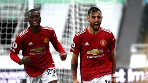 <p>Manchester United’s Bruno Fernandes (right) celebrates his goal at Newcastle (Alex Pantling/PA)</p>