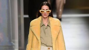 <p>A model presents a creation for Bottega Veneta's' Women Fall - Winter 2020 fashion collection on February 22, 2020 in Milan. (Photo by Miguel MEDINA / AFP) (Photo by MIGUEL MEDINA/AFP via Getty Images)</p>