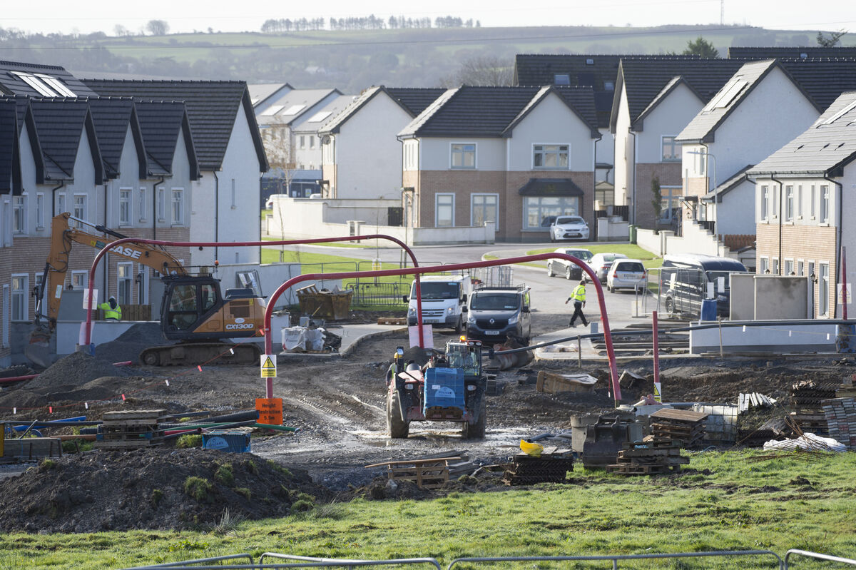 Under the current government, Covid-19 regulations construction work can continue. Builders working at the Janeville housing estate in Carrigaline, Co Cork. Picture Dan Linehan