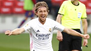 <p>LUKA ME: Real Madrid's Luka Modric celebrates scoring his side's third goal in La Liga' El Clasico at the Camp Nou on Saturday.</p>