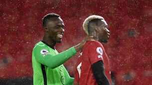 <p>OLD FRIENDS: Chelsea goalkeeper Edouard Mendy greets Manchester United's Paul Pogba after the final whistle at Old Trafford. </p>