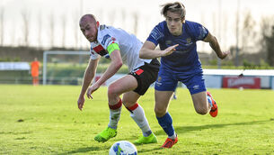 <p>Waterford's Matty Smith in action against Chris Shields of Dundalk at the RSC. Photo by Sam Barnes/Sportsfile</p>