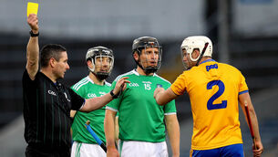 <p>Clare’s Jack Browne is booked by Referee Fergal Horgan during yesterday's Munster Championship clash. Picture: INPHO/Ryan Byrne</p>