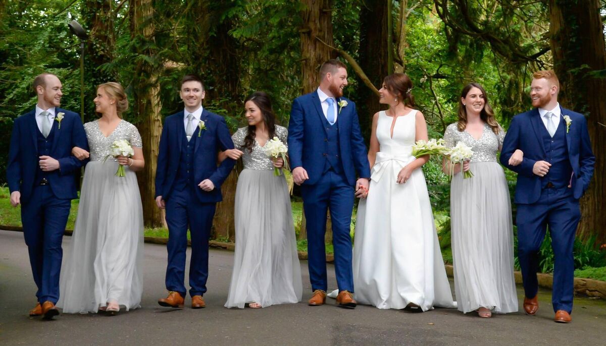 Laura Welch and Podge McSweeney with their wedding party Laura Welch and Podge McSweeney with their wedding party