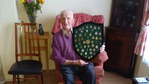 <p>Jimmy Lynam, Glen Rovers legend, with his impressive medal haul.</p>