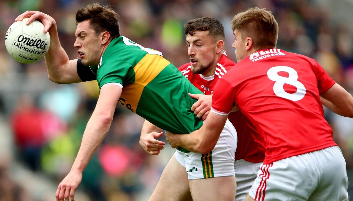 Kerry's David Moran tackled by Nathan Walsh and Ian Maguire of Cork during last year's Munster final. Picture: INPHO/James Crombie