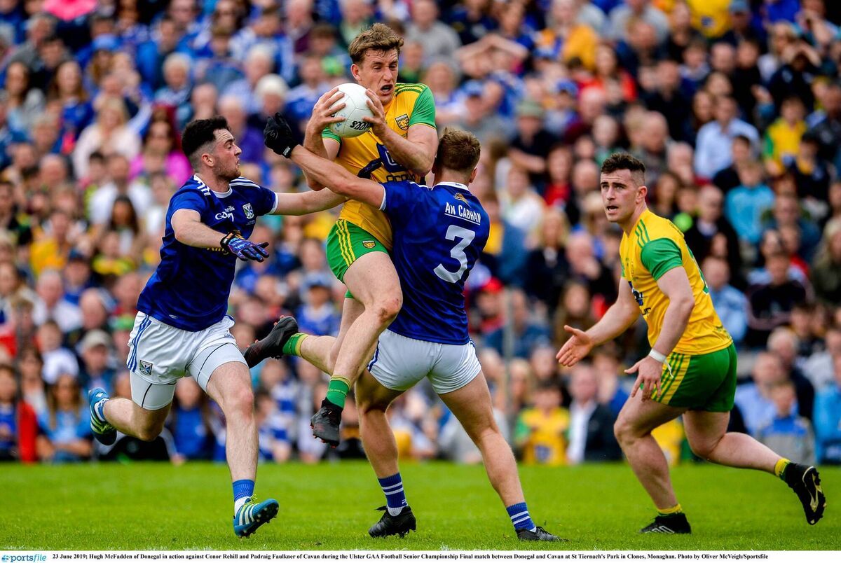 Donegal's Hugh McFadden in action against Conor Rehill and Padraig Faulkner of Cavan during last year's Ulster final. Photo by Oliver McVeigh/Sportsfile