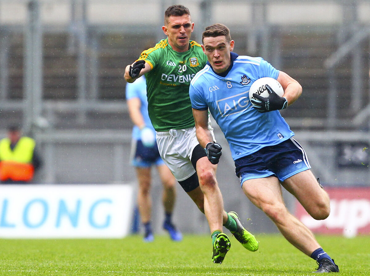 Dublin's Brian Fenton chased by Shane McEntee of Meath during last year's Leinster final. Picture: INPHO/Ken Sutton