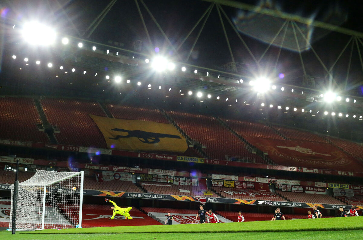 Arsenal's Nicolas Pépé scores their third goal past Dundalk goalkeeper Gary Rogers. Picture: INPHO/Tommy Dickson