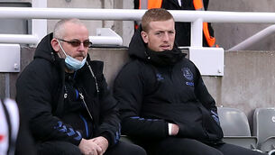 <p>Everton goalkeeper Jordan Pickford (right) was on the bench at St James’ Park (Alex Pantling/PA)</p>