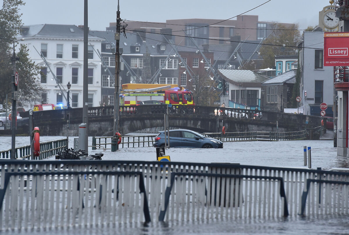  A car in the flood water at Fr. Matthew Quay in Cork. Picture: Dan Linehan