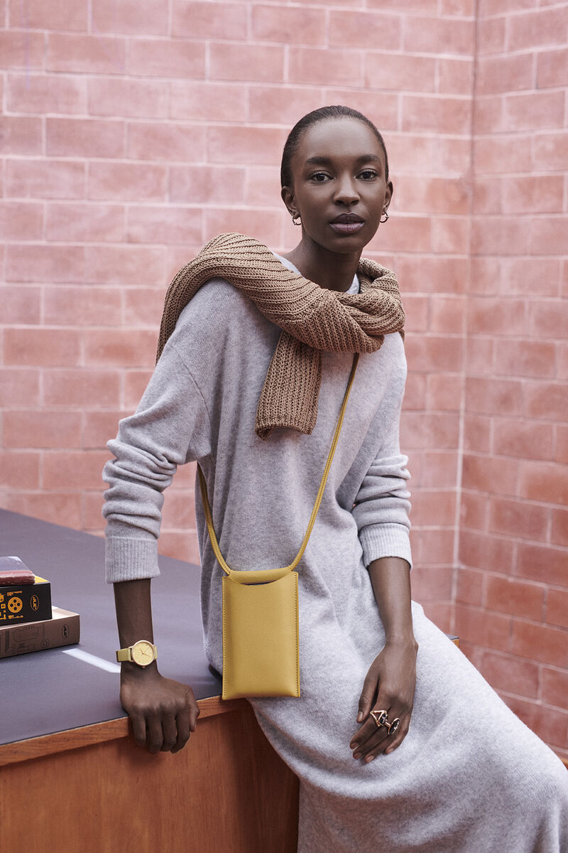 Knitted dress, €45.00; cardigan, €45.99; watch, €35.99; phone case, €19.99, parfois.com