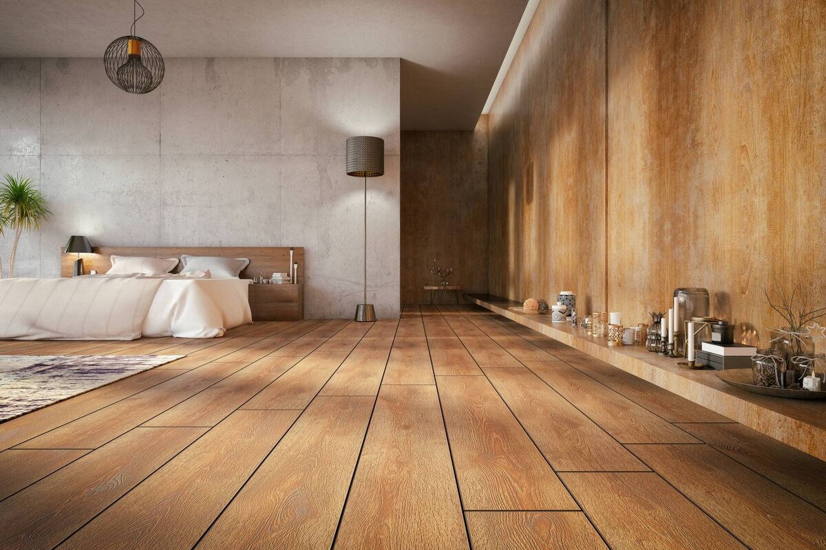 Large stark spaces can take on an inviting feel with high quality linens and interesting accent lighting.