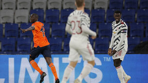 <p>Basaksehir's Demba Ba, left, celebrates after scoring his side's opening goal. Pictures: AP</p>