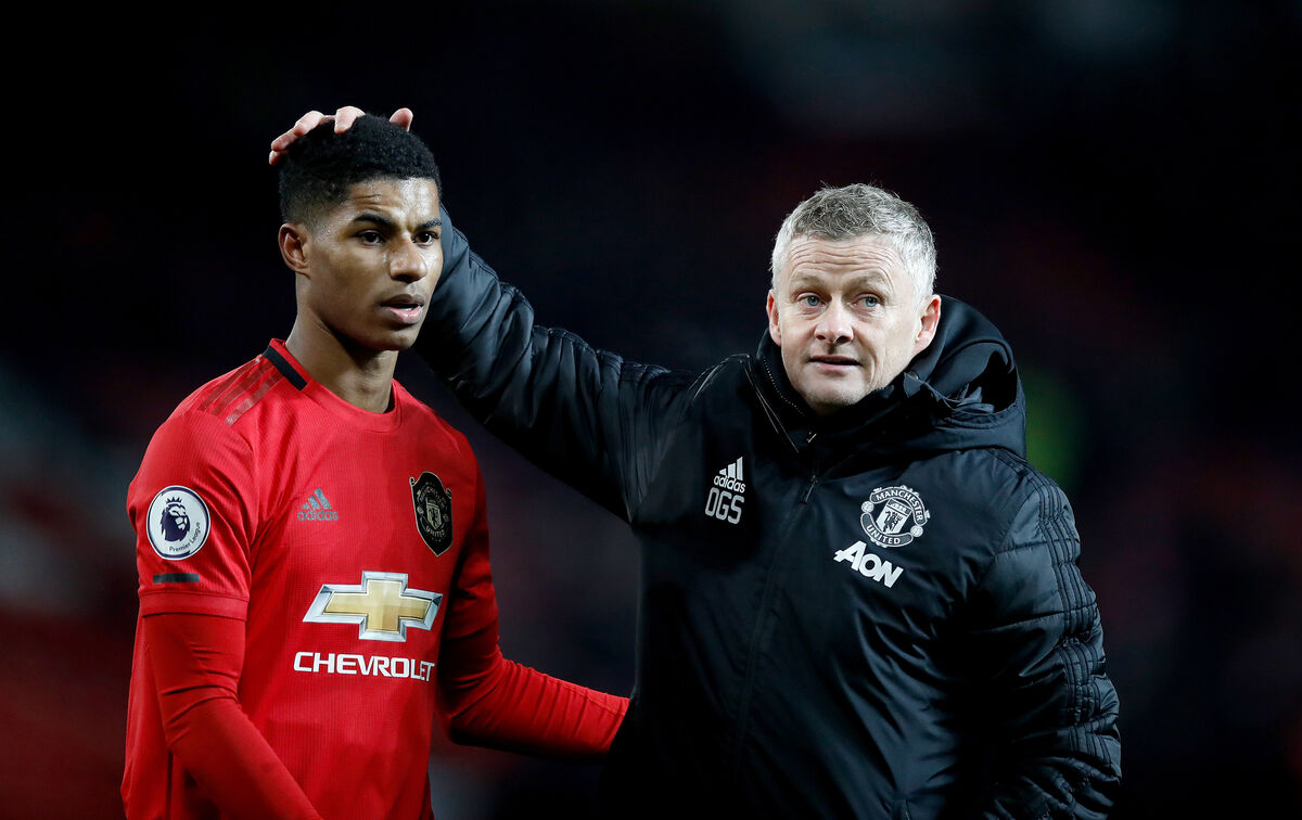 Manchester United manager Ole Gunnar Solskjaer with Marcus Rashford