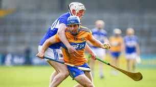 <p>Clare's Shane O'Donnell is tackled by Colm Stapleton of Laois. Picture: INPHO/Ken Sutton</p>