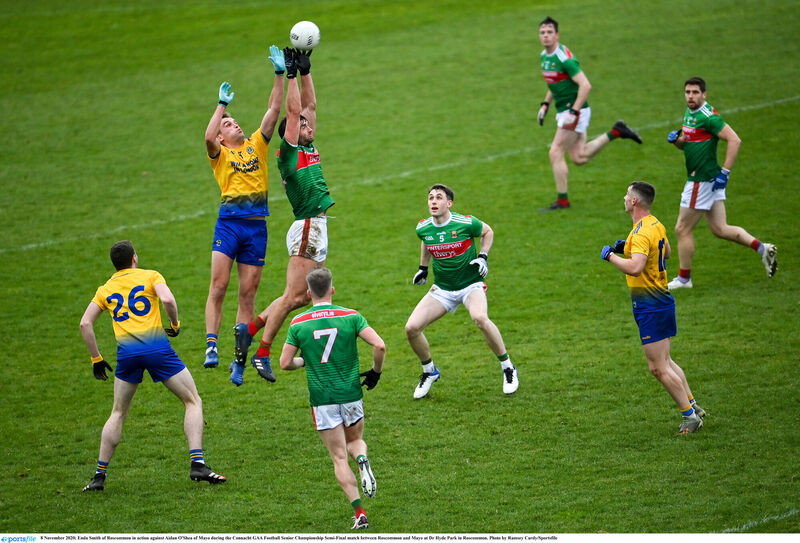 Enda Smith of Roscommon in action against Aidan O'Shea. Picture: Ramsey Cardy/Sportsfile