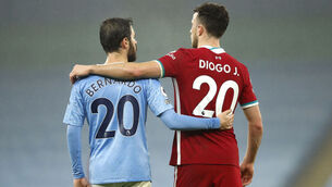 <p>Manchester City’s Portuguese star Bernardo Silva meets up with his fellow countryman, Liverpool’s Diogo Jota, at the final whistle in yesterday’s Premier League match at the Etihad Stadium. <span class="contextmenu emphasis CaptionCredit">Picture: PA</span>
            </p>