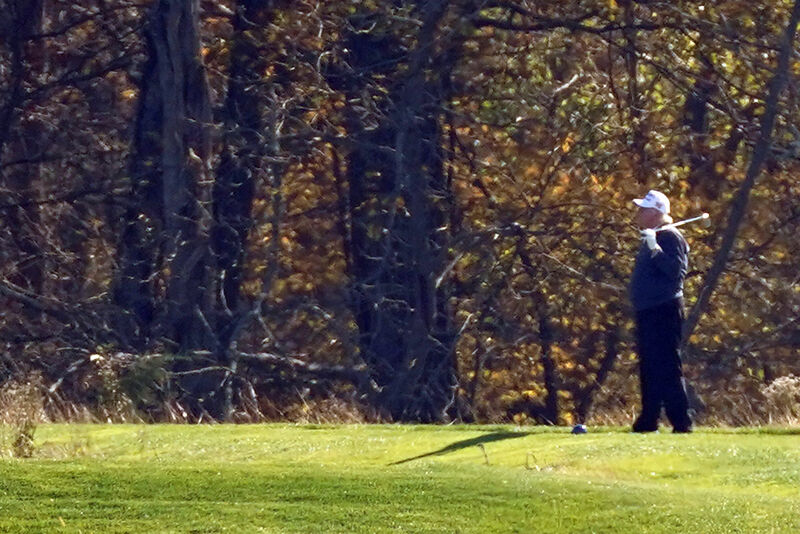 President Donald Trump plays a round of Golf at the Trump National Golf Club in Sterling Va. on Sunday. Picture: AP Photo/Steve Helber