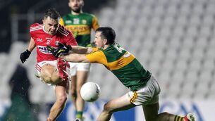 <p>POCKET ROCKET: Cork's MVP Seanie Powter is blocked down by Kerry's Paul Murphy on Sunday at Páirc ui Chaoimh.</p>