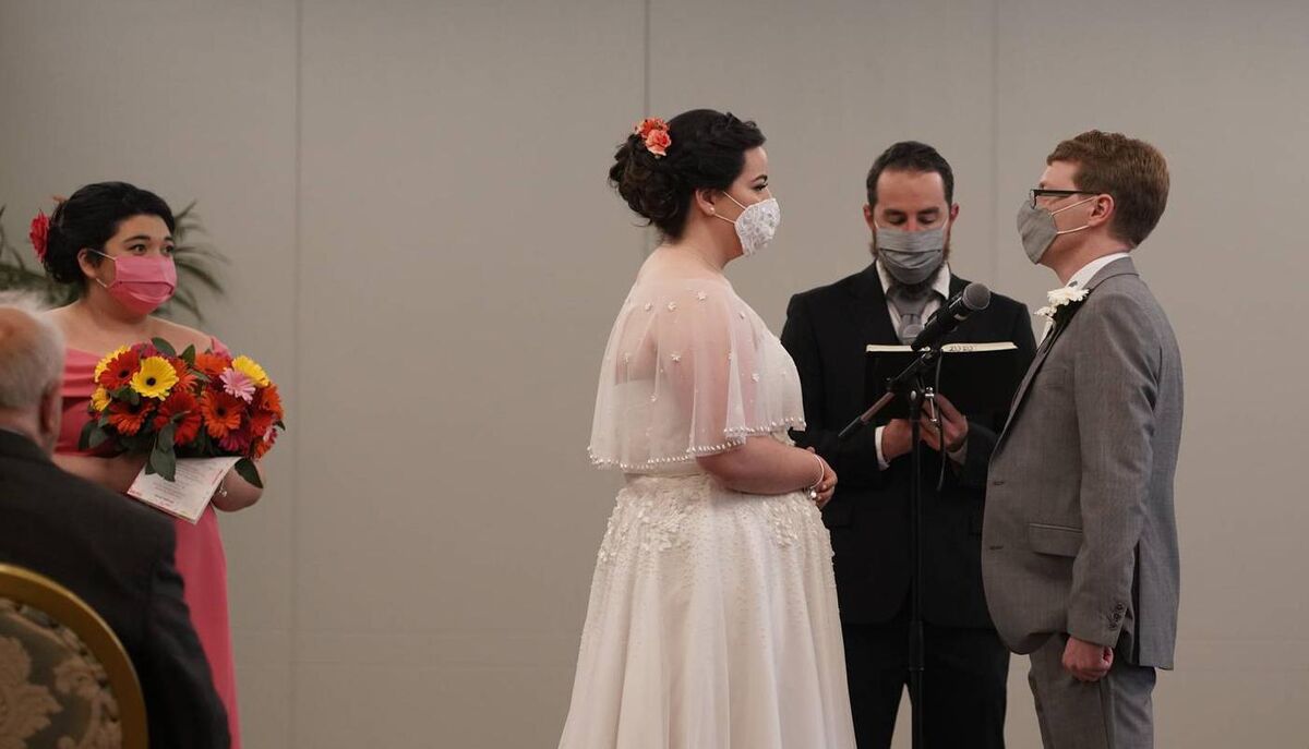 Pastor Mike Neglia officiates at Jackie and Matthew's wedding