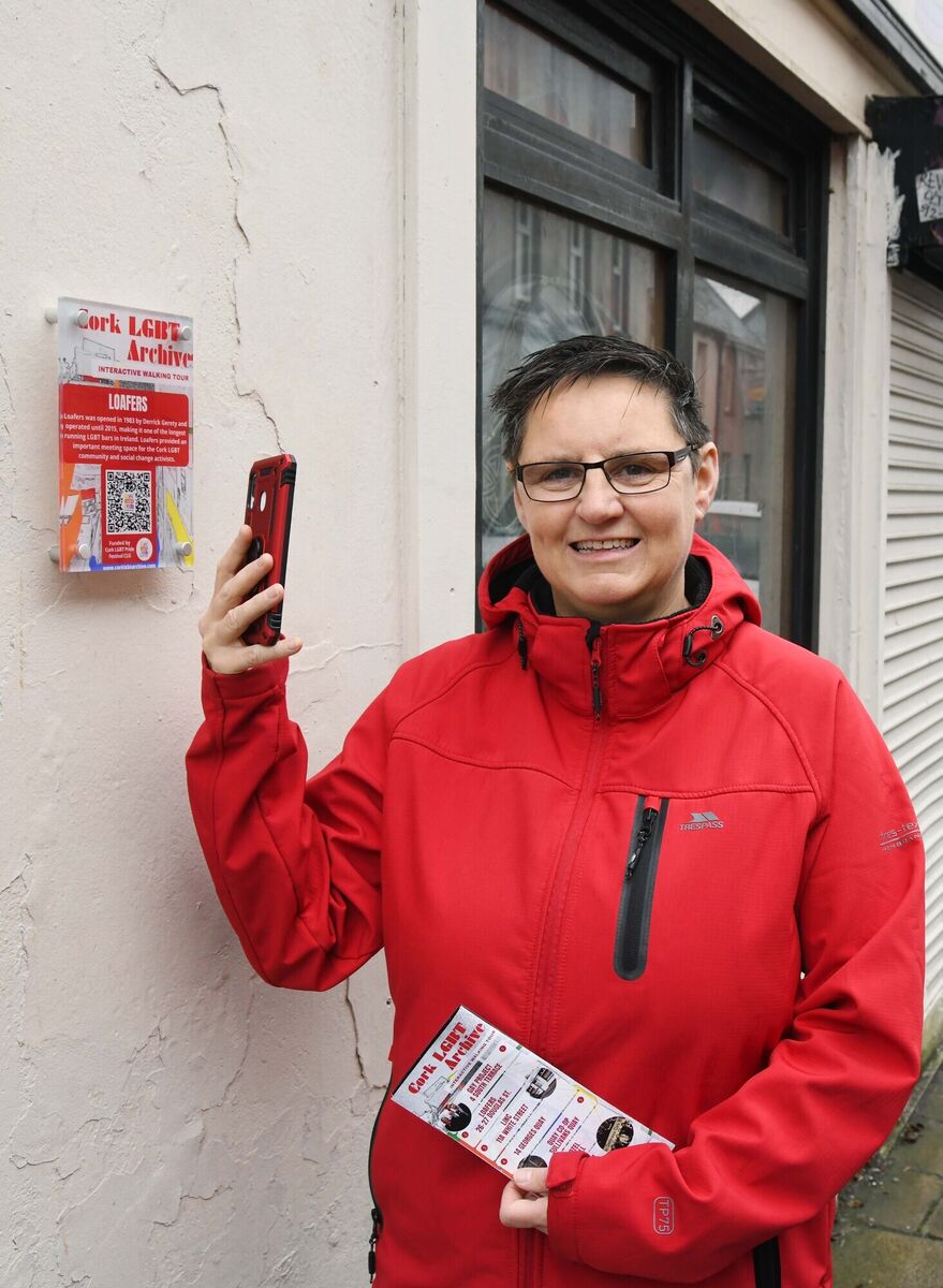 Orla Egan, creator and curator, Cork LGBT Archive, at a Cork LGBT Archive interactive tour plaque with a QR code outside Loafers Bar (1983-2015) at Douglas St, Cork. File picture: Denis Minihane