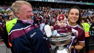 <p>Rebecca Hennelly of Galway with her father Gerry and seven-month-old niece Anna O'Reilly following last year's All-Ireland final win. Hennelly scored two points from sideline cuts (worth two points each) against Cork last weekend in a 0-15 to 0-12 win. Picture: Ramsey Cardy/Sportsfile</p>
