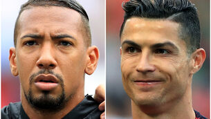 <p>Jerome Boateng and Cristiano Ronaldo (Mike Egerton/PA)</p>