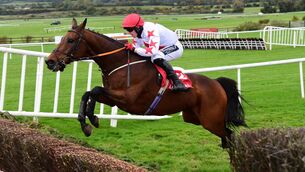 <p>Darver Star and Keith Donoghue jump the last to win the Ladbrokes Beginners Steeplechase at Punchestown. (Photo Healy Racing)</p>