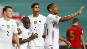 <p>N’Golo Kante, second left, was on target as France beat Portugal in Lisbon (Armando Franca/AP)</p>
