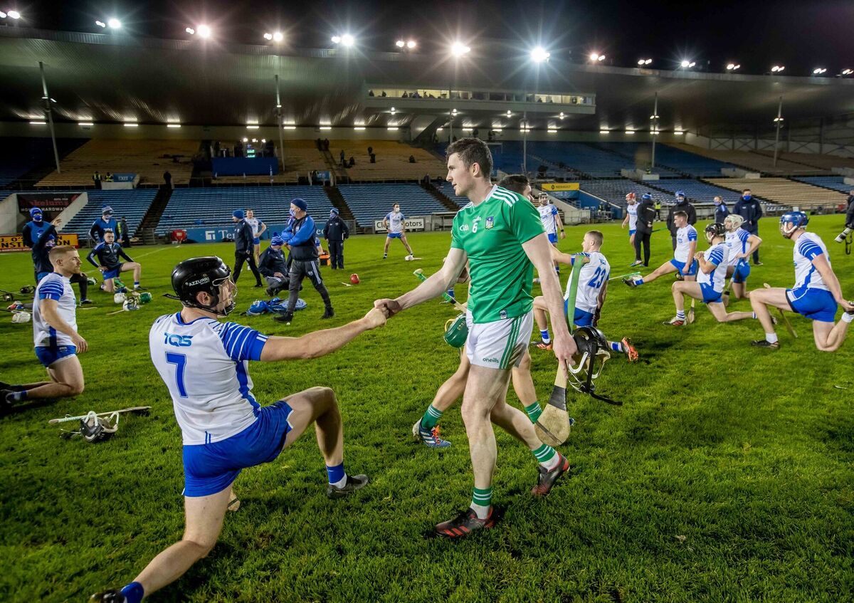 Limerick’s Declan Hannon commiserates with Waterford’s Kevin Moran after the game. Picture: INPHO/Morgan Treacy
