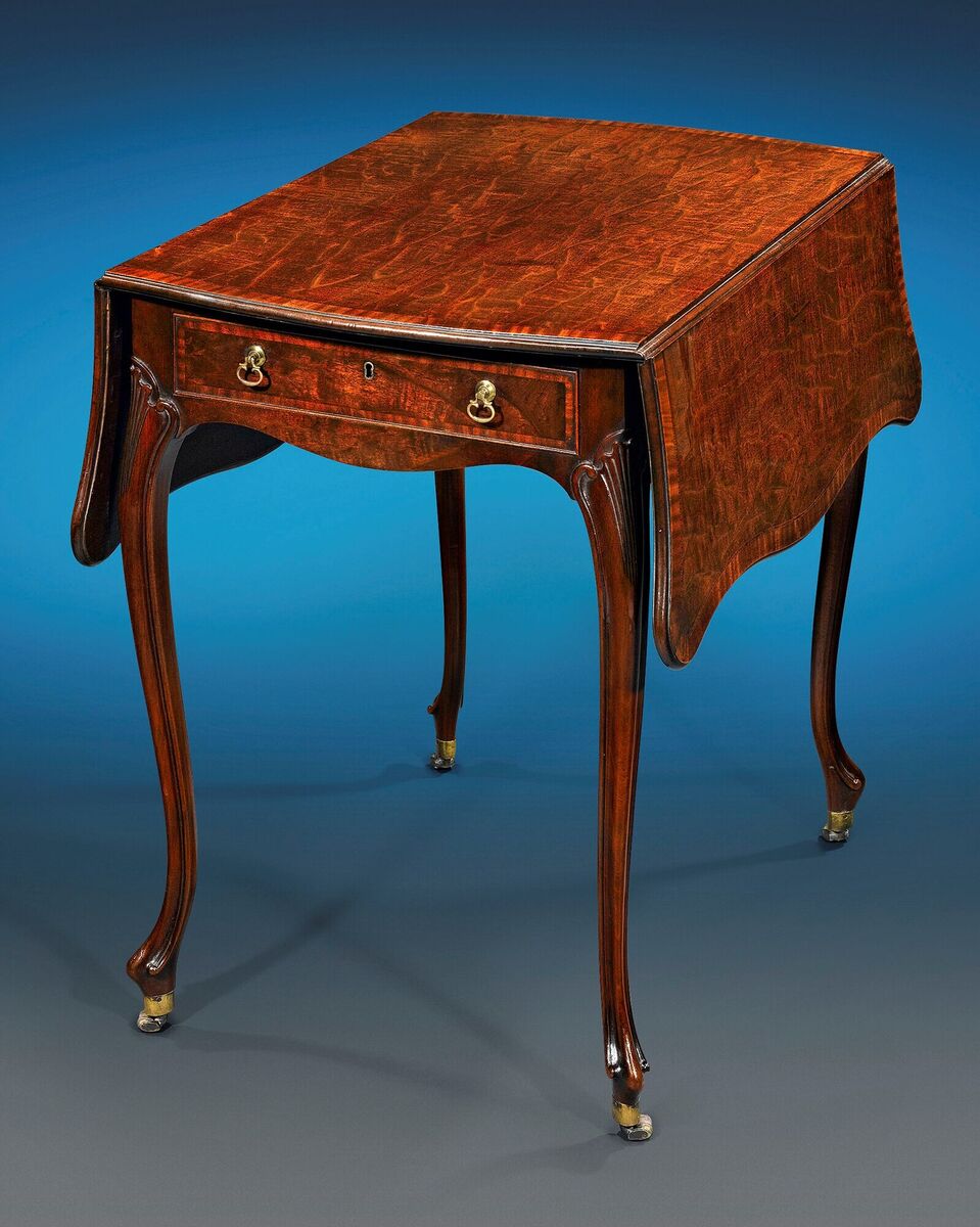 A Pembroke table by Thomas Chippendale (1718 -1779) fin crocodile-grained mahogany with cabriole legs, made for Paxton House, Rau Antiques. A Pembroke table by Thomas Chippendale (1718 -1779) fin crocodile-grained mahogany with cabriole legs, made for Paxton House, Rau Antiques.