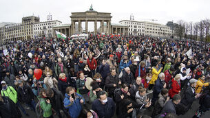 Protests have been growing in Germany in recent weeks (AP Photo/Michael Sohn)