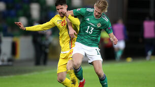 <p>Northern Ireland were held to a draw by Romania as they dropped out of League B (Niall Carson/PA)</p>