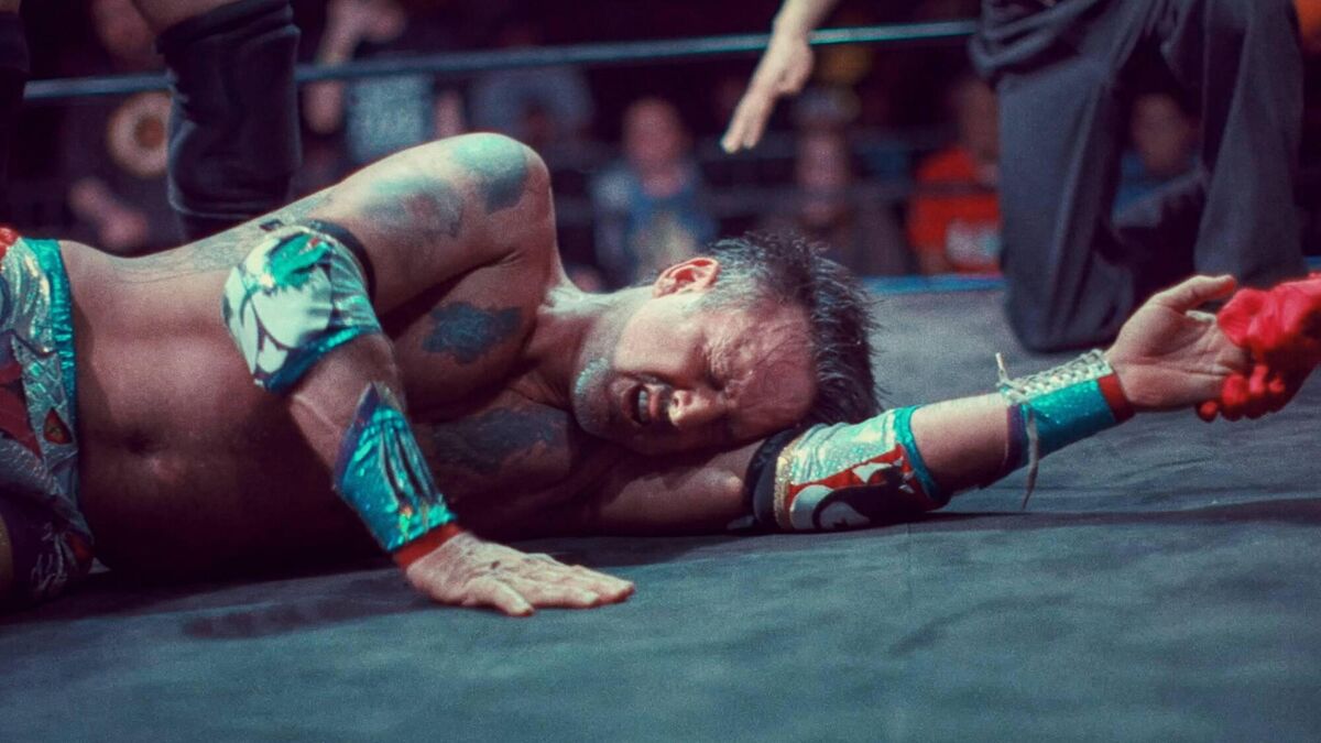  Down for the count: David Arquette risks staring at the lights for a three-count as he lies on the mat during a weapons-filled brawl.