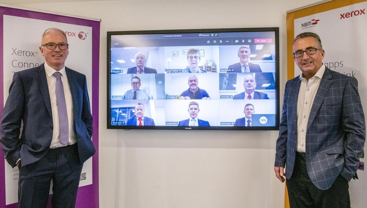 Michael Galvin, managing director of National Business Machines (NBM), with Don Mullins, newly appointed sales director, with their sales team video conferencing in, adapting to the new ways of working. NBM is celebrating 35 years in business, a €750,000 expansion and five new appointments. Pictures: Brian Lougheed