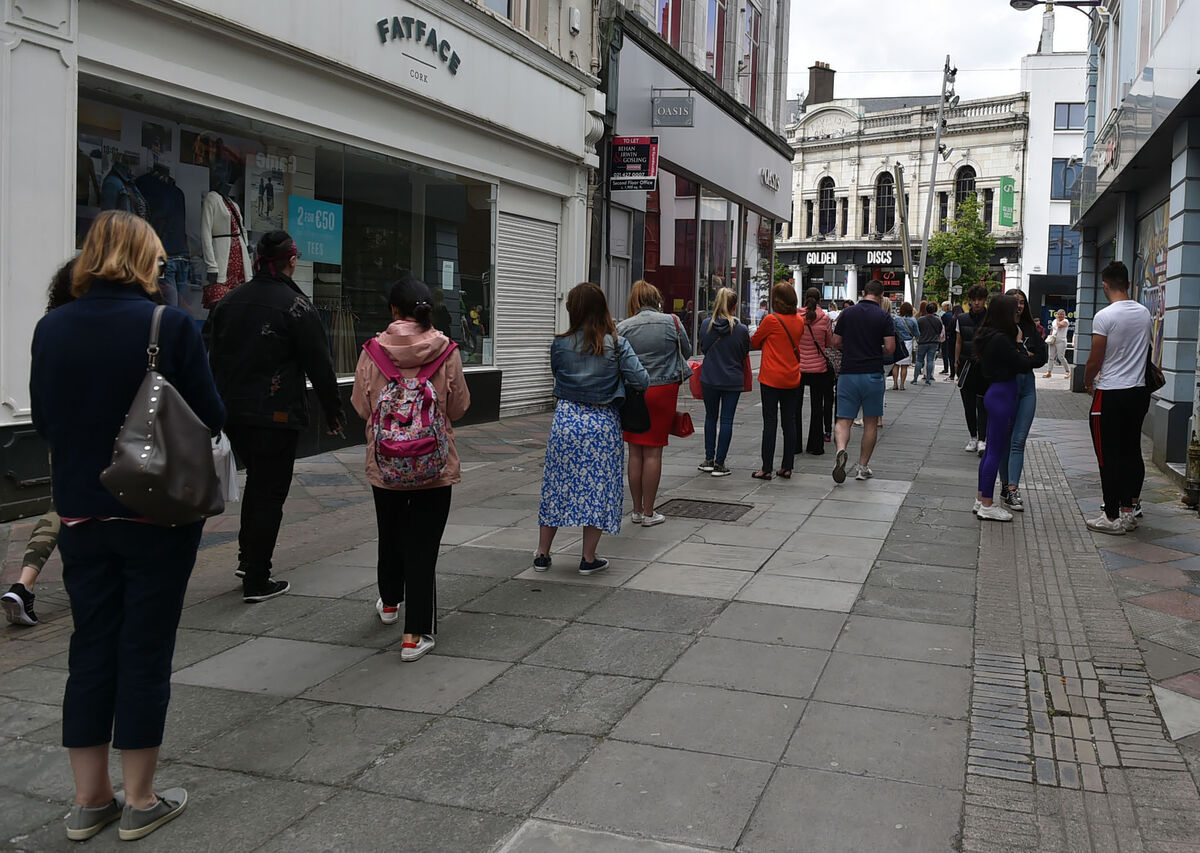 Shoppers queuing on Cork's Princes Street after the first lockdown was lifted. Similar scenes are expected from next week. Picture: Eddie O'Hare
