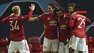 <p>Manchester United's Bruno Fernandes celebrates with team-mates after scoring the opening goal at Old Trafford. (AP Photo/Dave Thompson)</p>