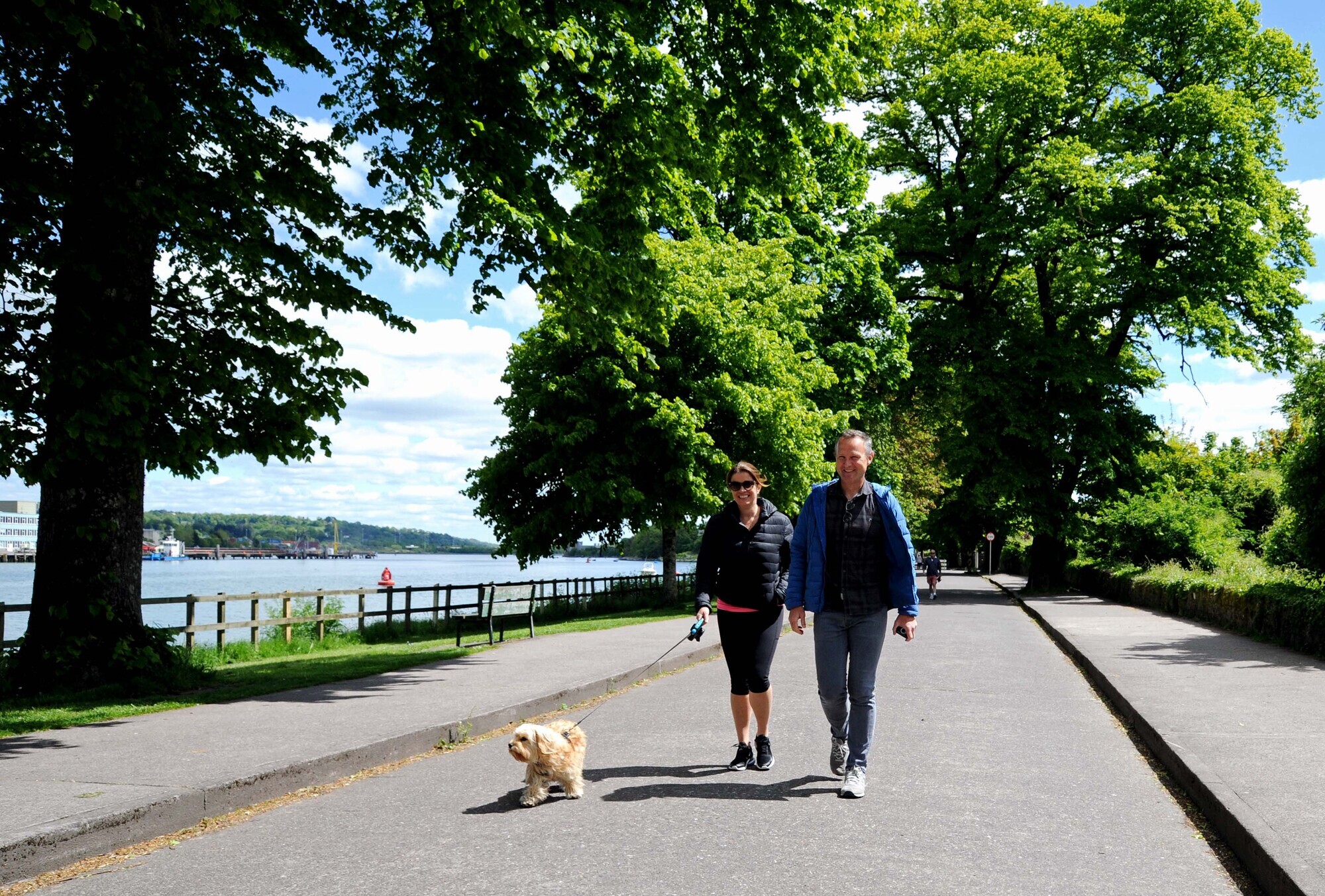 Barry and Rhona Guiney, Blackrock, Cork, and Ollie enjoying a walk at the Marina in Cork which was open to pedestrians and cyclists from the entrance to Páirc Uí Chaoimh to the junction with Church Avenue this year. Picture: Denis Minihane