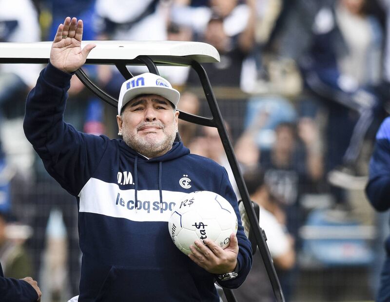 HAND OF GOD: Diego Maradona greets fans on his presentation as new coach of Gimnasia y Esgrima La Plata in 2019. Picture: Marcelo Endelli/Getty Images