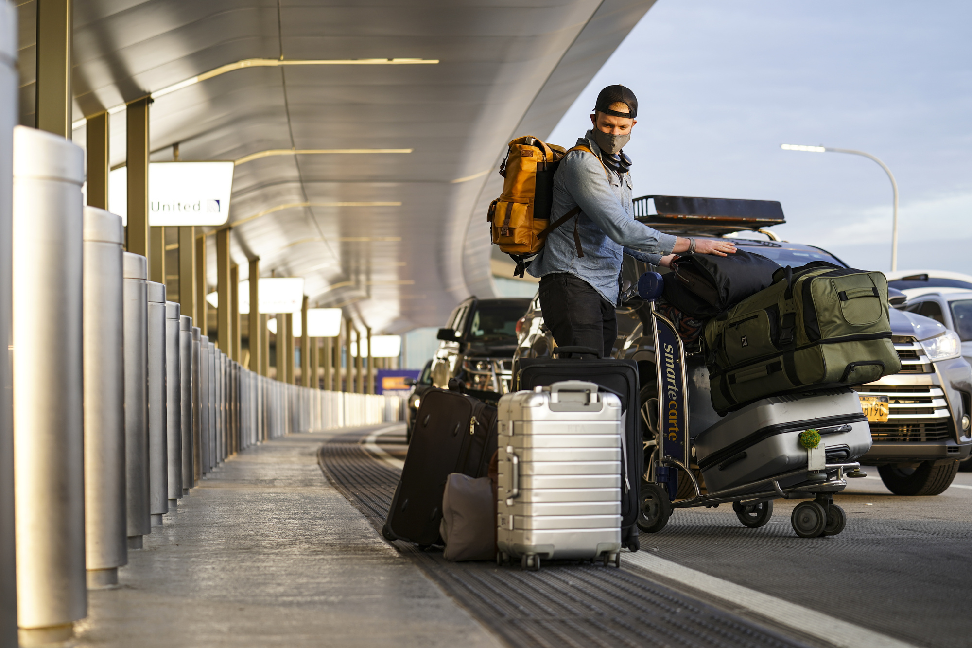 Americans travel home for Thanksgiving despite coronavirus surge