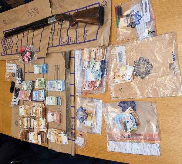 Two men and two women arrested following seizure of cash, drugs and shotgun
