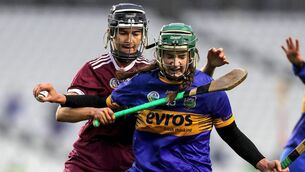 <p>UNDER PRESSURE: Tipperary's Miriam Campion under the cosh as Aoife Donohue of Galway comes in to challenge in Saturday's All-Ireland Camogie semi-final at Páirc Ui Chaoimh.</p>