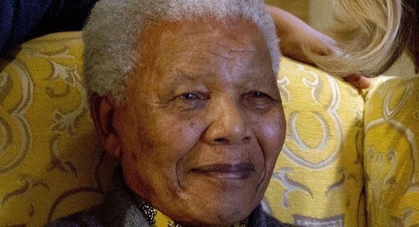 Mandela 'continuing to improve'