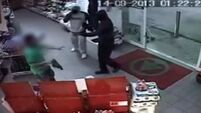 Shopkeeper fends off armed robbers – with his shoe