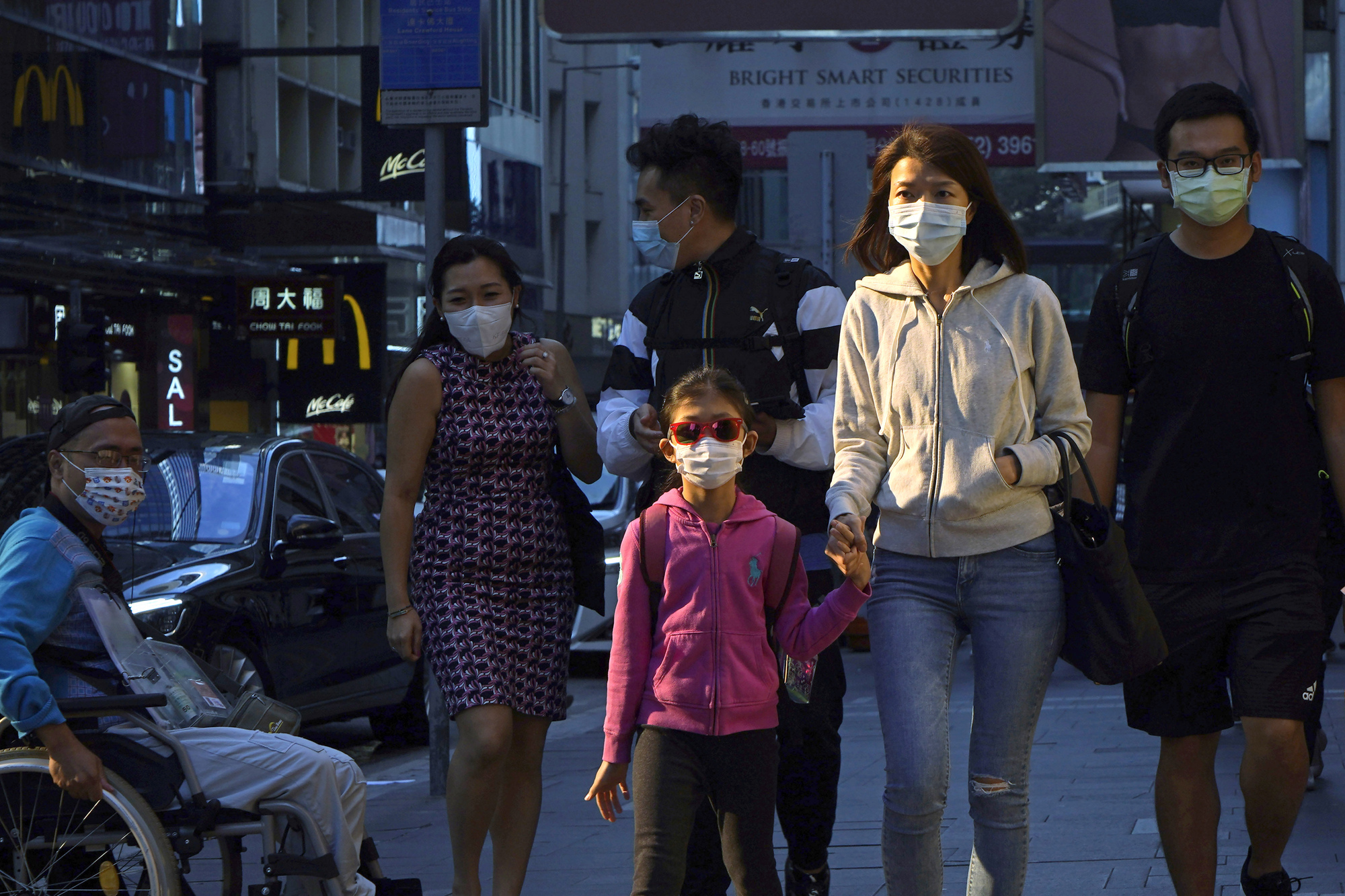 Hong Kong’s leader urges people to stay at home amid pandemic surge