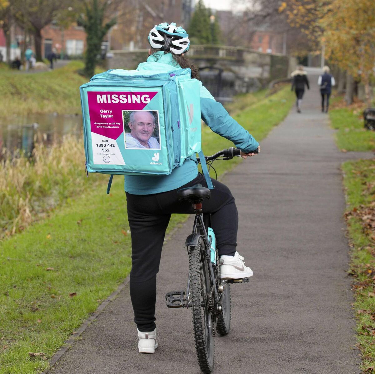 A Deliveroo rider with a food delivery bag showing a picture of Gerard Taylor from Dundrum who was 55 when he disappeared from his home on 25 May 2019. Picture: Peter Houlihan