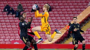 <p>Liverpool goalkeeper Caoimhin Kelleher impressed on his Champions League debut (Jon Super/PA)</p>